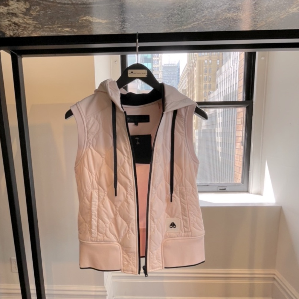 Pink moose knuckles puffer vest with hood